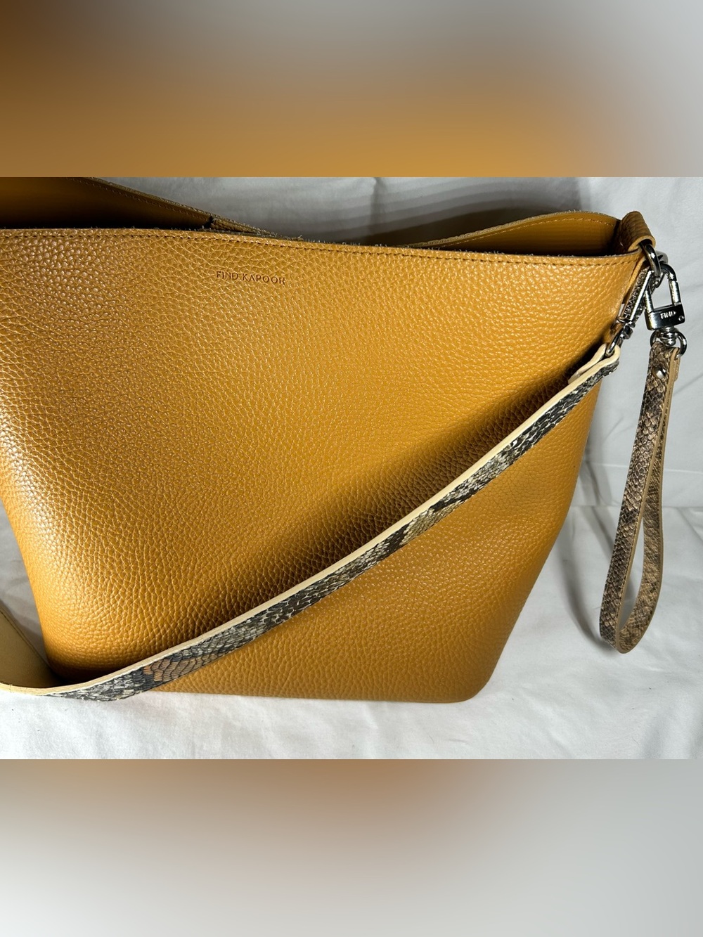 Find Kapoor Bucket Bag Camel Faux Leather Crossbody bag with Snake Strap